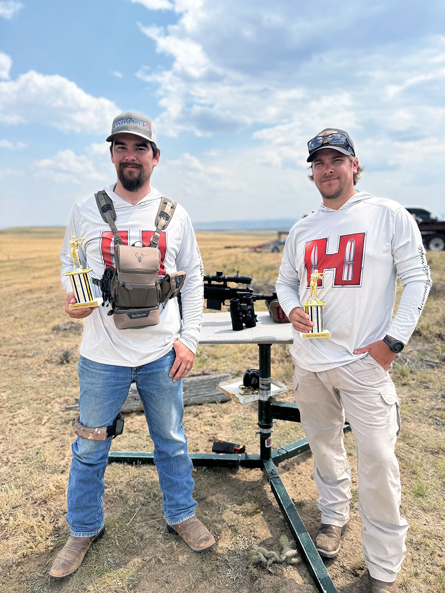 Jeremiah Polacek and Zak May with their trophies for longest shot with a rifle and longest shot with a handgun for this particular trip.